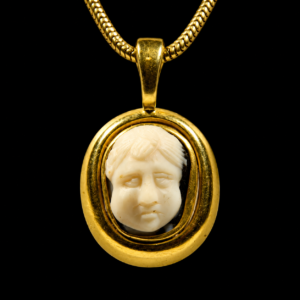 Roman Onyx Cameo with a Facing Head Set in a Gold Pendent