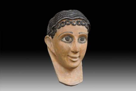 A Fine Egyptian Gypsum Mask of a Young Girl