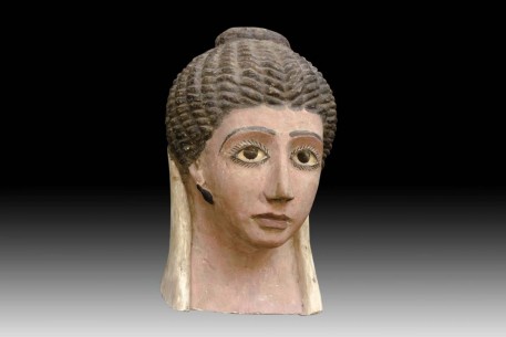A Fine Egyptian Gypsum Mask of a Young Woman