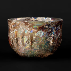 An Aubergine Ribbed Glass bowl