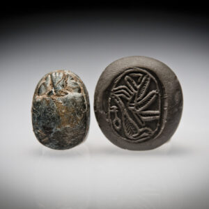 A Hyksos Steatite Scarab Engraved with a Locust and a Bird