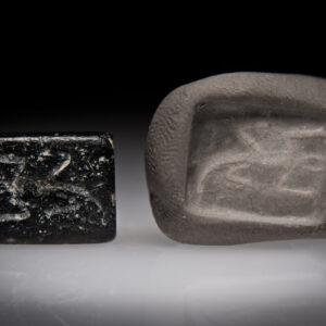 A Late Canaanite Andesite Double Stamp Seal with a Lizard and a Stag