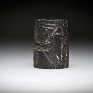 An Early-Dynastic Andesite Cylinder Seal with Two Gazelles Eating from a Palm Tree
