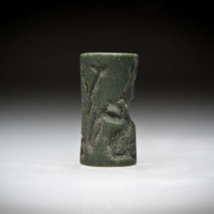 Akkadian Green Serpentine Cylinder Seal with a Figure and Two Fighting Lion