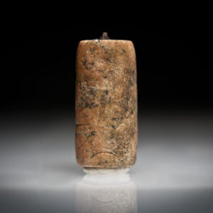 A Mesopotamian Pink Jasper Cylinder Seal with Winged Griffins