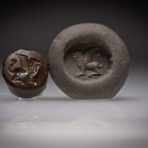 A Phoenician Hematite Seal of a Winged Lion