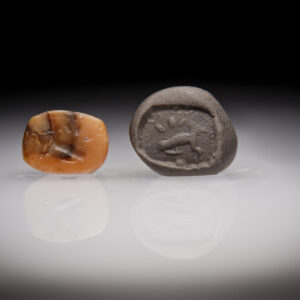 A Phoenician Chalcedony Seal with a Seated Dog