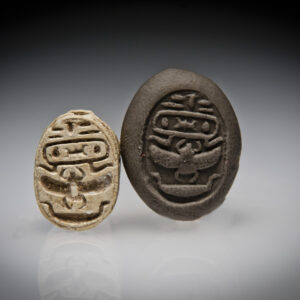 An Egyptian Steatite Scarab Engraved with Cartouche and a Winged Beetle