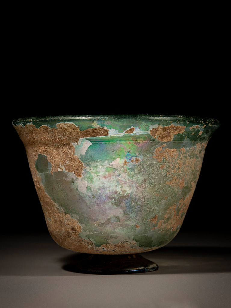 A Large Glass Bowl with A Pedestal Foot
