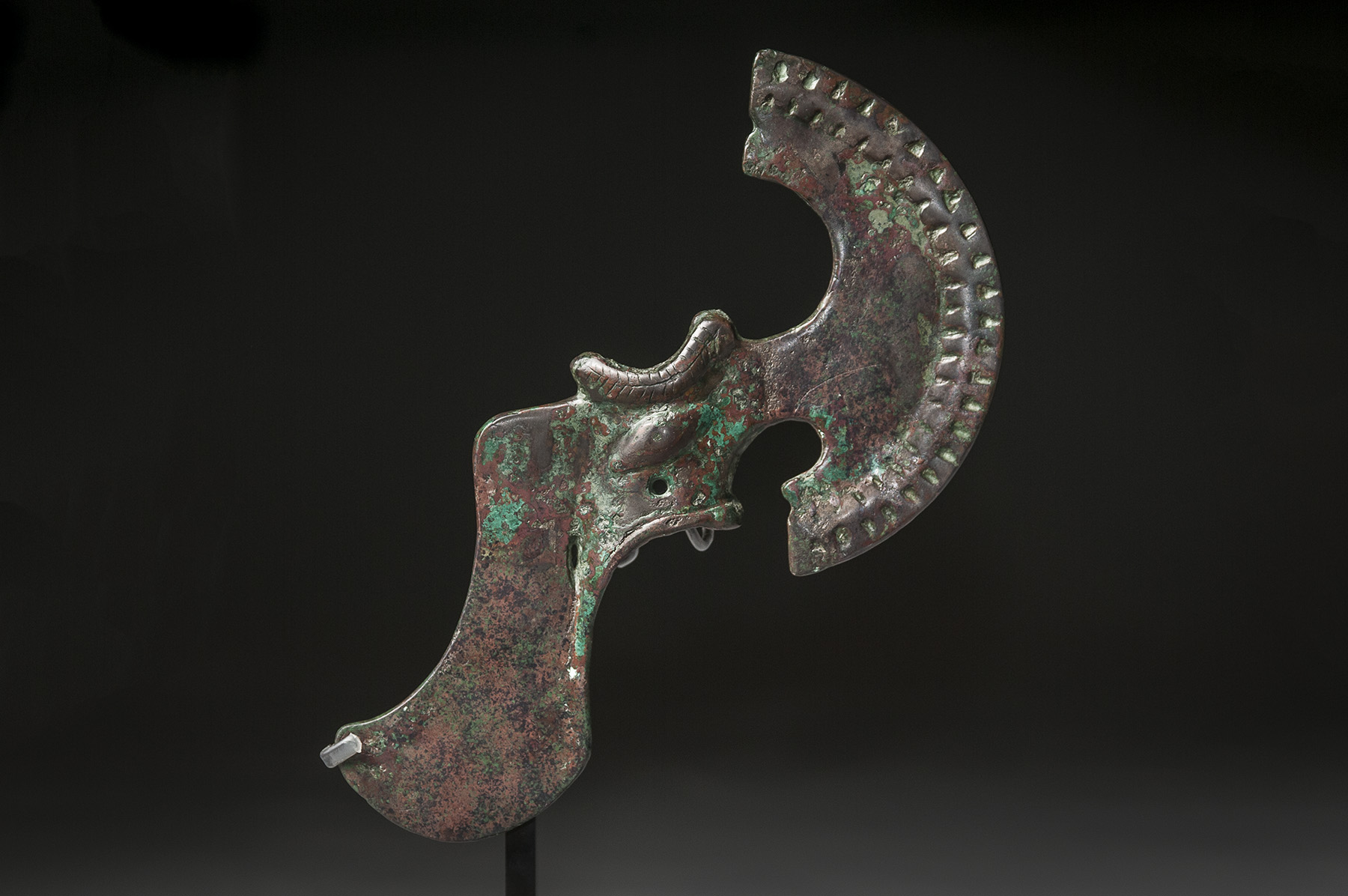 Bactrian Bronze Axe Head with Eyes