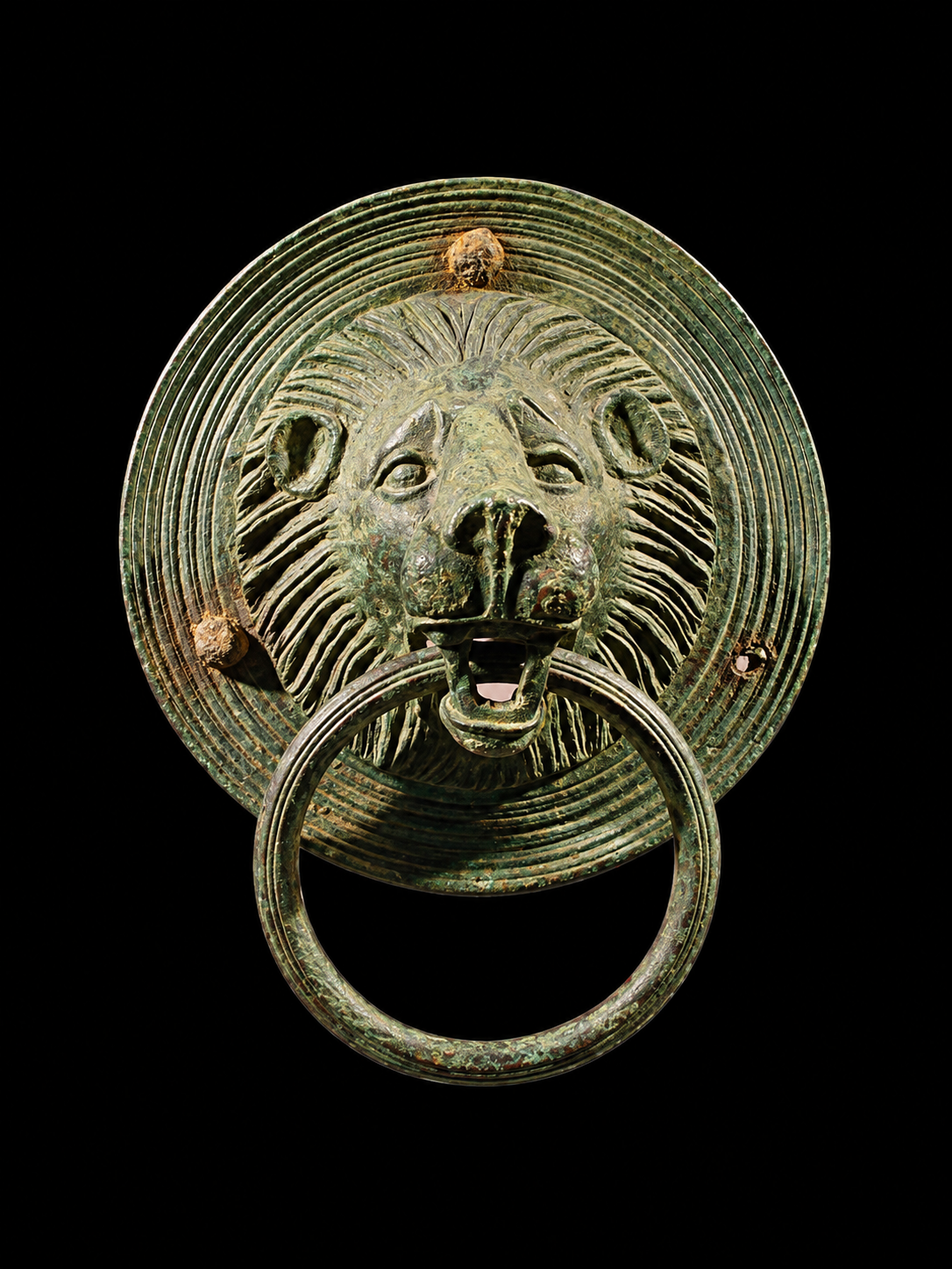 Bronze Handle in the Shape of a Lion’s Head