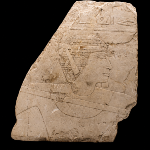 A large Egyptian Limestone Relief Depicting a Man Fishing
