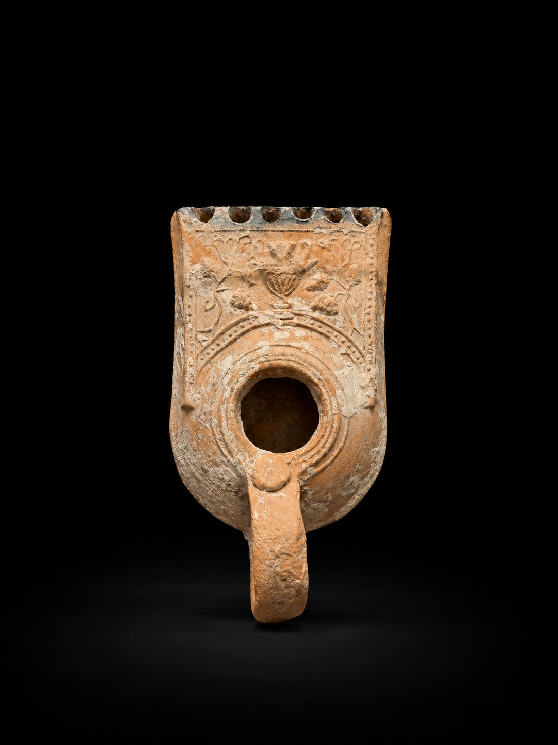 A Judean Beit Nattif Terracotta Oil Lamp with Amphora