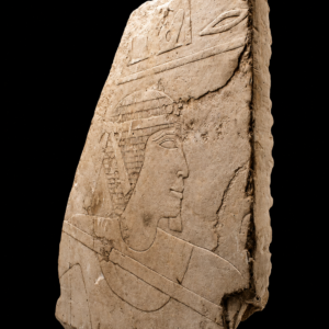 A large Egyptian Limestone Relief Depicting a Man Fishing