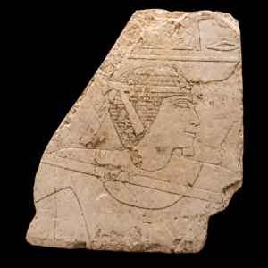 A large Egyptian Limestone Relief Depicting a Man Fishing