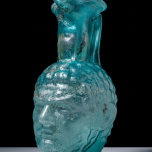 Roman glass jug in the form of an emperor head